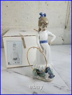 1989 NAO by Lladro Porcelain Figurine Nina con aro y perrito No. 379 dog