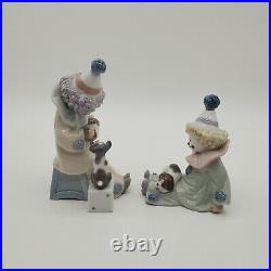 A Pair of Vintage Lladro Porcelain Clown with Dog Figurines #5279 and #5277