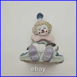 A Pair of Vintage Lladro Porcelain Clown with Dog Figurines #5279 and #5277