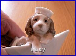 A Stunning Lladro 6642 Little Stowaway Puppy Figure. Mint
