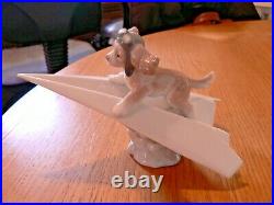 A Stunning Lladro 6665 Lets Fly Away Puppy Figure. Mint