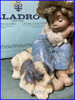 Collectible vintage porcelain figurines Lladro #2208 Let's Rest Boy withhis dog