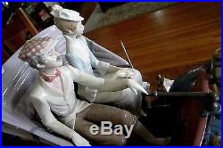 Delightful LLADRO Couple in Horseless Carriage with Dogs
