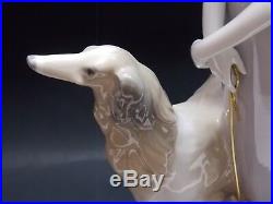 Figurine sculpture lladro lady with dog girl dog lladro. 4594