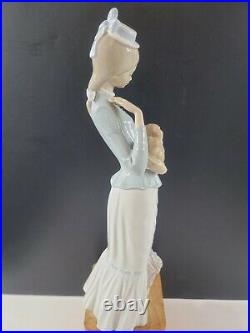 LLADRO #4893 A Walk With The Dog Woman with Small Dog & Umbrella 1974 Marking