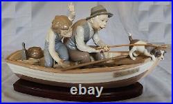 LLADRO #5215 FISHING WITH GRAMPS Gramps, Boy, Dog in Boat withWood Base