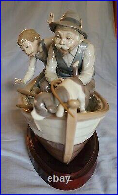 LLADRO #5215 FISHING WITH GRAMPS Gramps, Boy, Dog in Boat withWood Base