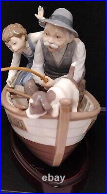 LLADRO #5215 FISHING WITH GRAMPS Gramps, Boy, Dog in Boat withWood Base