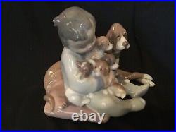 LLADRO #5456 NEW PLAYMATES Boy with dogs