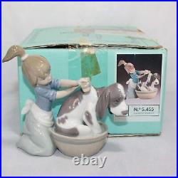 LLADRÓ Bashful Bather Dog Figurine. Porcelain Girl Figure