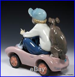 LLADRO OUT FOR A SPIN #5770 YOUNG BOY DRIVING With HIS DOG $590 VALUE MIB