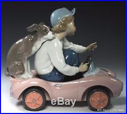 LLADRO OUT FOR A SPIN #5770 YOUNG BOY DRIVING With HIS DOG $590 VALUE MIB