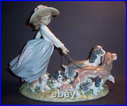 LLADRO PUPPY PARADE GIRL WITH DOG FIGURINE Retail$1599