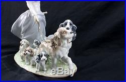 LLADRO Privilege Porcelain Girl with Walking Dogs and Puppies