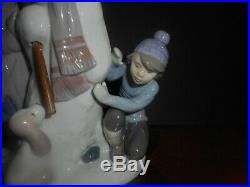 LLadro snowman with children and dog