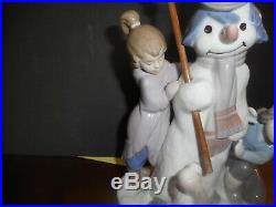 LLadro snowman with children and dog