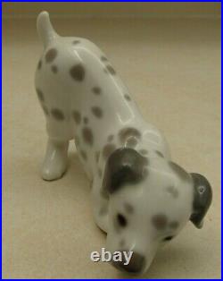 Lladro 1261 Dalmatian Dalmatian puppy dog playing MWOB, RV$475