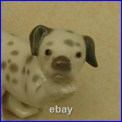 Lladro 1261 Dalmatian Dalmatian puppy dog playing MWOB, RV$475