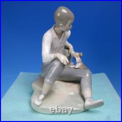 Lladro 1283 Little Boy with Sandels Laying with Puppy Dog and Large Rock