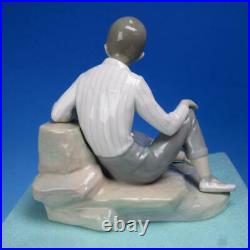 Lladro 1283 Little Boy with Sandels Laying with Puppy Dog and Large Rock