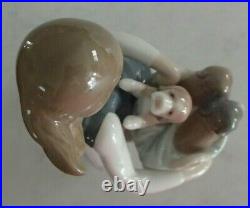 Lladro 1311 Girl with Puppies girl w little dogs on her hip EUC with orig. Box