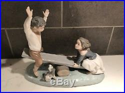 Lladro 4867 BOY AND GIRL ON SEE SAW WITH DOG