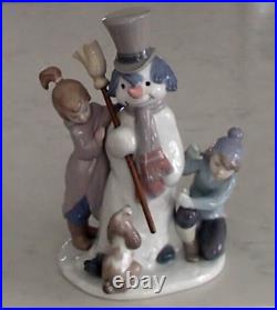 Lladro 5713 The Snowman girl & boy with dog building a snowman MWOB, RV$495