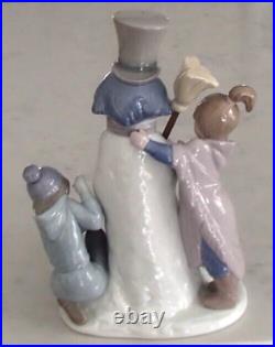 Lladro 5713 The Snowman girl & boy with dog building a snowman MWOB, RV$495