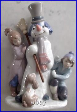 Lladro 5713 The Snowman girl & boy with dog building a snowman MWOB, RV$495