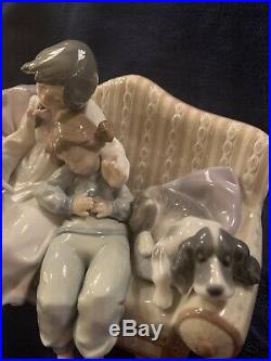 Lladro 5735 girl reading to child with dog on the couch. MINT CONDITION
