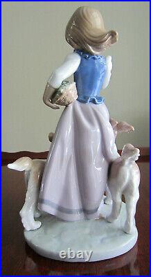 Lladro # 5761 Out for a Romp A Girl, Her Two Dogs & A Basket Of Flowers