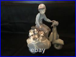 Lladro #5794 Precious Cargo Boy Motorbike Puppies