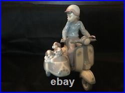 Lladro #5794 Precious Cargo Boy Motorbike Puppies