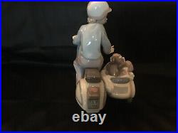 Lladro #5794 Precious Cargo Boy Motorbike Puppies