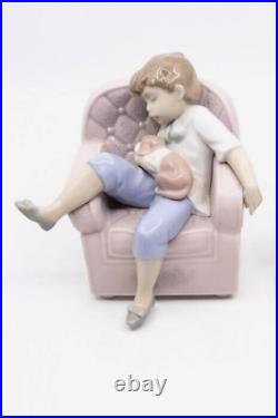 Lladro 6549 Naptime with Friends Boy with Puppy Sleeping on Chair Figurine