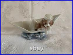 Lladro 6642 Little Stowaway Dog with Sailor Hat in Paper Boat Figurine # 6642