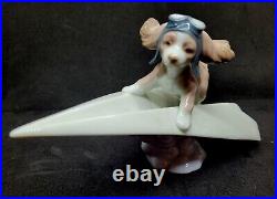 Lladro #6665 Let's Fly Away Adorable Puppy on a Paper Airplane