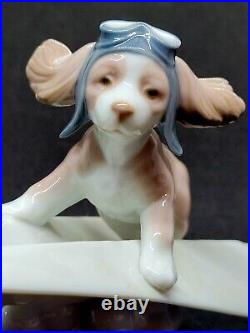 Lladro #6665 Let's Fly Away Adorable Puppy on a Paper Airplane