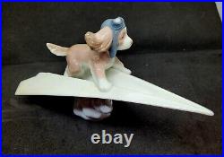 Lladro #6665 Let's Fly Away Adorable Puppy on a Paper Airplane