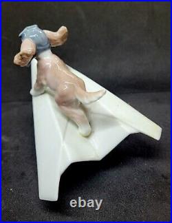 Lladro #6665 Let's Fly Away Adorable Puppy on a Paper Airplane