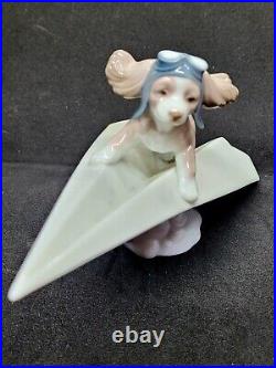 Lladro #6665 Let's Fly Away Adorable Puppy on a Paper Airplane