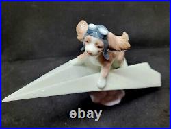 Lladro #6665 Let's Fly Away Adorable Puppy on a Paper Airplane