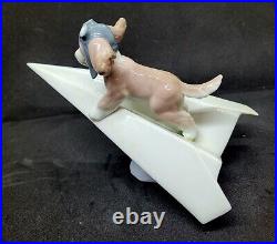 Lladro #6665 Let's Fly Away Adorable Puppy on a Paper Airplane