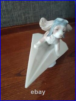 Lladro 6665 Let's Fly Away Dog on Paper Airplane Porcelain Figurine