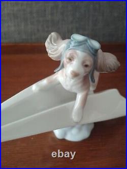 Lladro 6665 Let's Fly Away Dog on Paper Airplane Porcelain Figurine