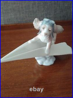 Lladro 6665 Let's Fly Away Dog on Paper Airplane Porcelain Figurine