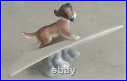 Lladro 6665 Let's Fly Away goggled puppy dog on a paper airplane MIB, RV$210