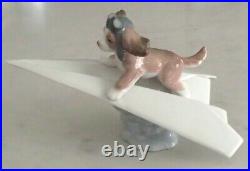 Lladro 6665 Let's Fly Away goggled puppy dog on a paper airplane MIB, RV$210