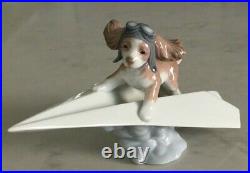 Lladro 6665 Let's Fly Away goggled puppy dog on a paper airplane MWOB, RV$210