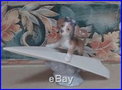 Lladro #6665 Let's Fly Away puppy dog in a paper airplane MINT, no box, RV$210